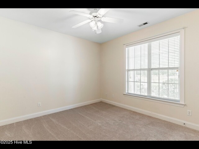 822 Lambrook Dr, Wilmington, NC 28411 - carpeted spare room featuring baseboards and a ceiling fan