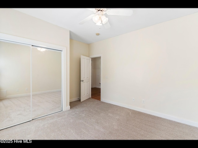 822 Lambrook Dr, Wilmington, NC 28411 - unfurnished bedroom with carpet, a closet, baseboards, and ceiling fan
