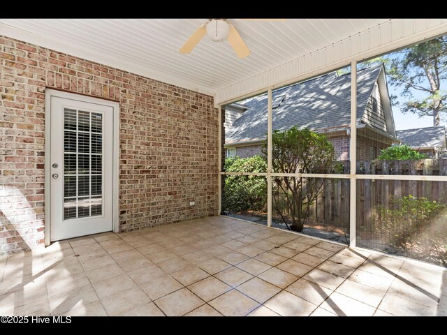 822 Lambrook Dr, Wilmington, NC 28411 - unfurnished sunroom with ceiling fan and plenty of natural light