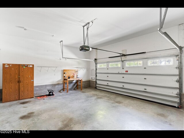 822 Lambrook Dr, Wilmington, NC 28411 - garage featuring a garage door opener