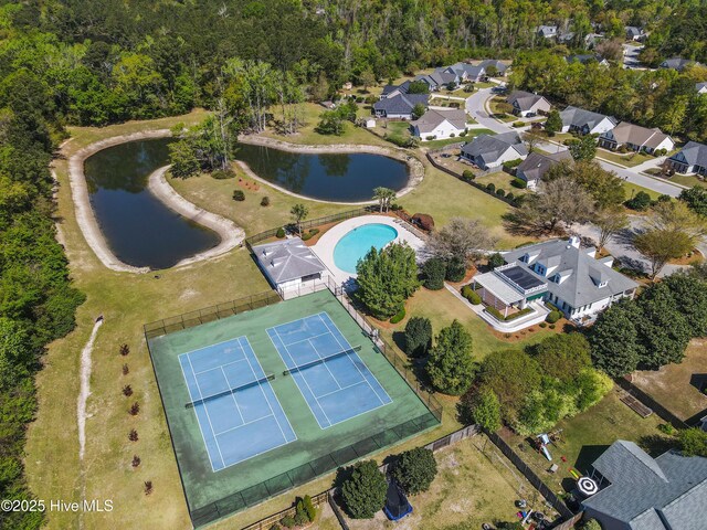 822 Lambrook Dr, Wilmington, NC 28411 - aerial view of property's location with a large body of water, a pool area, and nearby suburban area