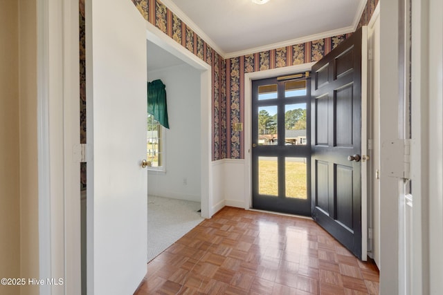 3007 Camelot Dr, Kinston, NC 28504 - entryway with wallpapered walls, crown molding, a wainscoted wall, and baseboards