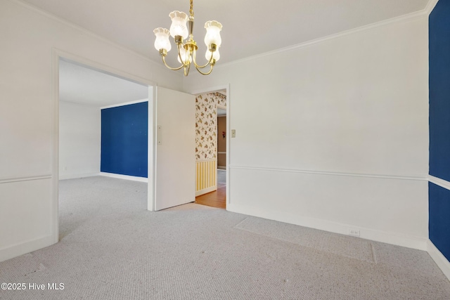 3007 Camelot Dr, Kinston, NC 28504 - empty room featuring carpet flooring, a chandelier, ornamental molding, and baseboards