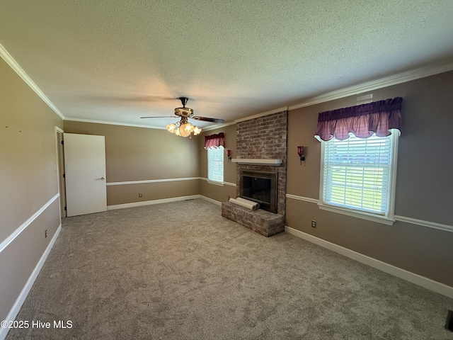 3007 Camelot Dr, Kinston, NC 28504 - unfurnished living room featuring a textured ceiling, crown molding, a ceiling fan, carpet flooring, and a fireplace