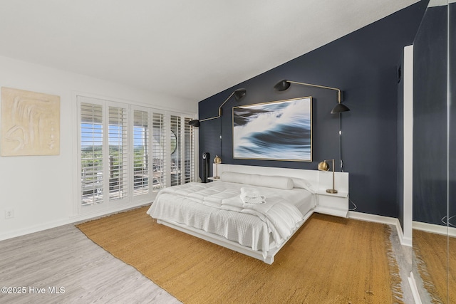 2106 E Fort Macon Rd Unit 310Tar, Atlantic Beach, NC 28512 - bedroom featuring wood finished floors and baseboards