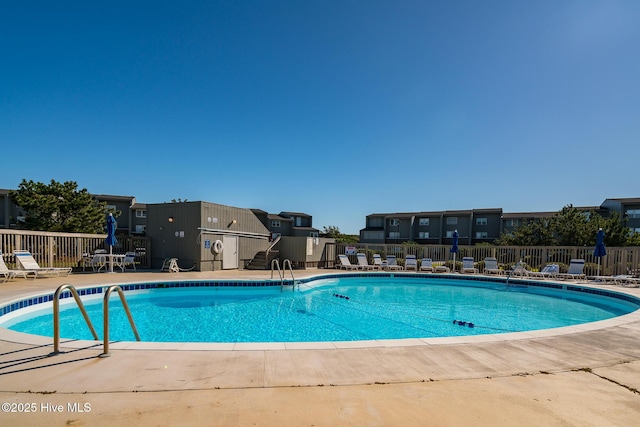 2106 E Fort Macon Rd Unit 310Tar, Atlantic Beach, NC 28512 - community pool featuring a patio and a residential view