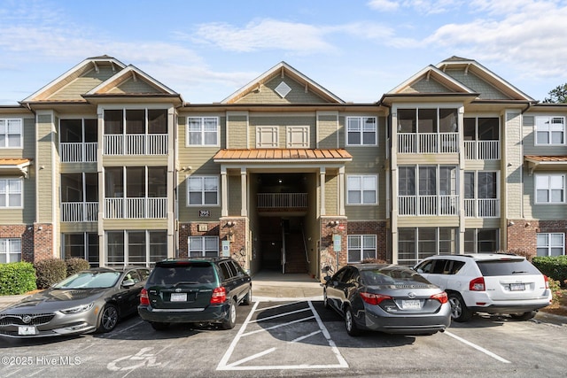 395 S Crow Creek Dr Unit 1511, Calabash, NC 28467 - view of property featuring uncovered parking