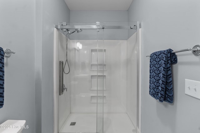 395 S Crow Creek Dr Unit 1511, Calabash, NC 28467 - full bathroom featuring a shower stall and toilet