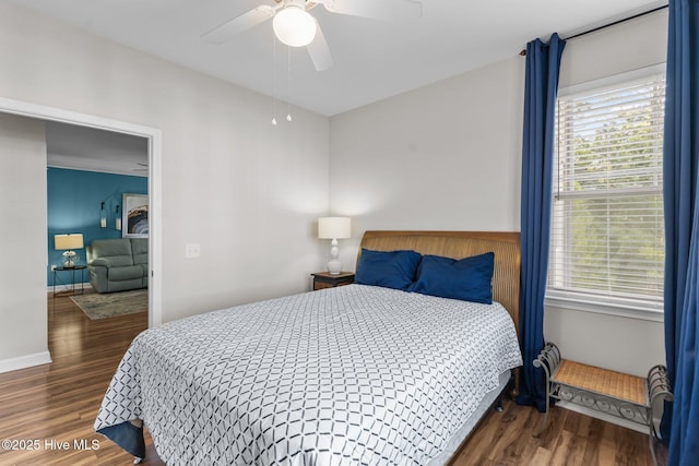 395 S Crow Creek Dr Unit 1511, Calabash, NC 28467 - bedroom with wood finished floors, baseboards, and a ceiling fan