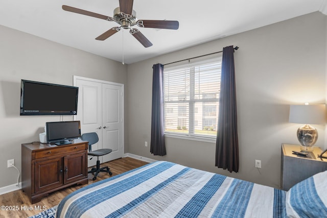 395 S Crow Creek Dr Unit 1511, Calabash, NC 28467 - bedroom with wood finished floors, baseboards, a ceiling fan, and a closet