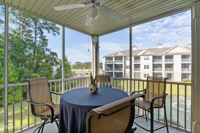 395 S Crow Creek Dr Unit 1511, Calabash, NC 28467 - sunroom with a ceiling fan and outdoor dining area