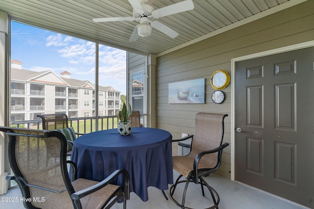 395 S Crow Creek Dr Unit 1511, Calabash, NC 28467 - sunroom / solarium with ceiling fan and outdoor dining space