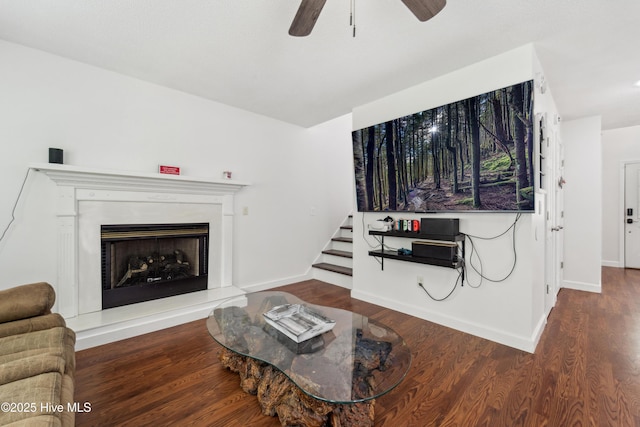 218 Yearling Loop, Jacksonville, NC 28540 - living area with ceiling fan, stairs, wood finished floors, and baseboards