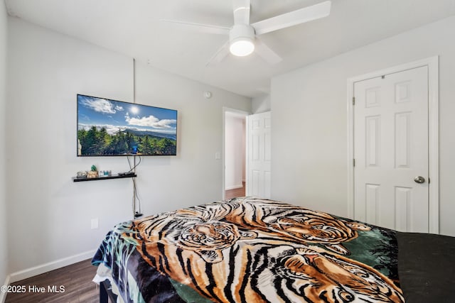 218 Yearling Loop, Jacksonville, NC 28540 - bedroom with wood finished floors, baseboards, and a ceiling fan