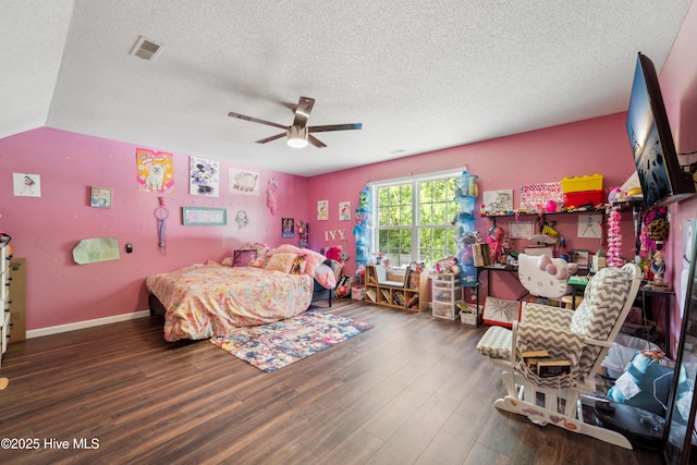 218 Yearling Loop, Jacksonville, NC 28540 - bedroom with wood finished floors, a textured ceiling, a ceiling fan, and baseboards