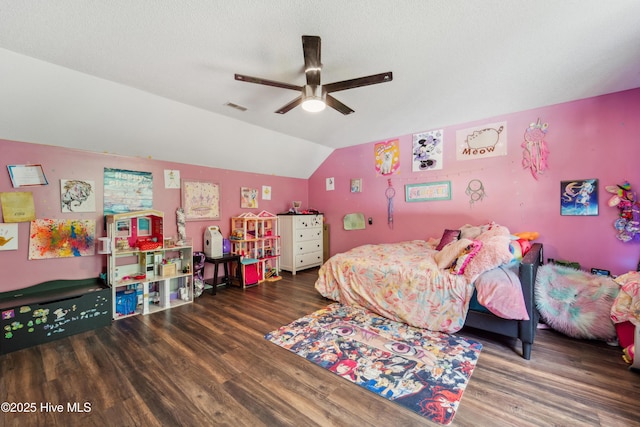 218 Yearling Loop, Jacksonville, NC 28540 - bedroom with wood finished floors, lofted ceiling, ceiling fan, and a textured ceiling