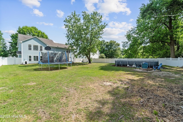 218 Yearling Loop, Jacksonville, NC 28540 - view of yard with a trampoline