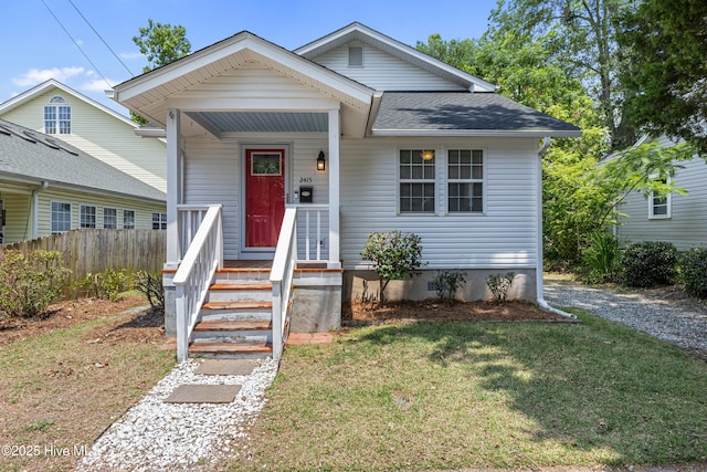 2415 Circle St, Wilmington, NC 28403 - bungalow featuring a shingled roof and a porch