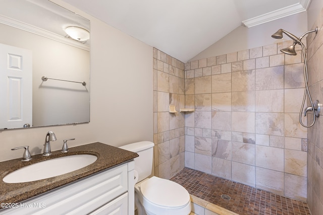 2415 Circle St, Wilmington, NC 28403 - full bathroom featuring toilet, a tile shower, vanity, lofted ceiling, and ornamental molding