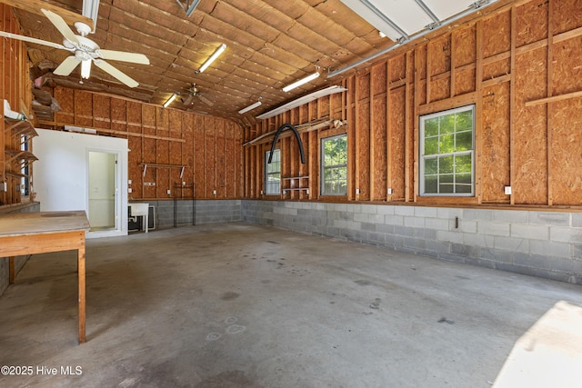2415 Circle St, Wilmington, NC 28403 - garage with concrete block wall and a ceiling fan