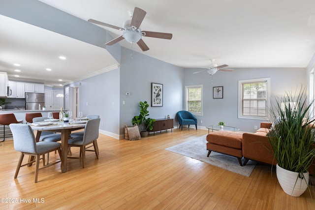 2415 Circle St, Wilmington, NC 28403 - dining room featuring ceiling fan, baseboards, light wood-style floors, recessed lighting, and vaulted ceiling