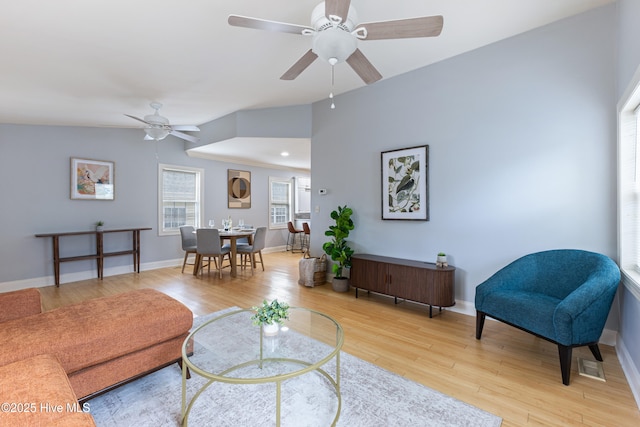 2415 Circle St, Wilmington, NC 28403 - living area featuring wood finished floors, ceiling fan, and baseboards