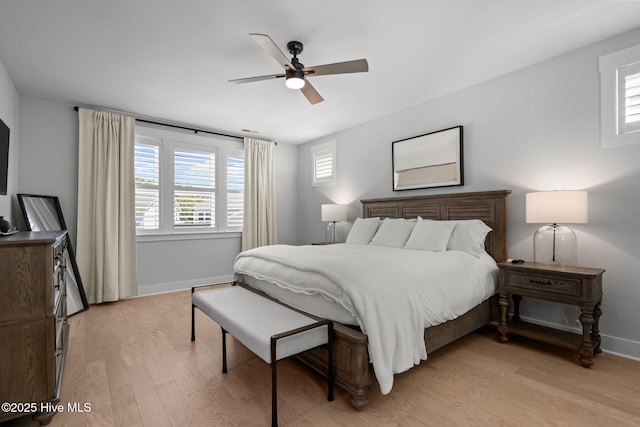 3625 Mason Port Dr, Wilmington, NC 28409 - bedroom featuring light wood-type flooring, baseboards, and ceiling fan