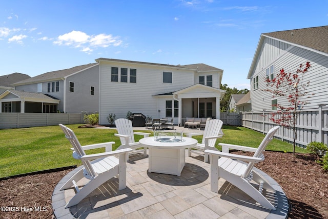 3625 Mason Port Dr, Wilmington, NC 28409 - back of house featuring a patio, a sunroom, and an outdoor living space with a fire pit