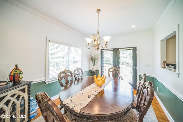 6428 Salem Ridge Dr, Grifton, NC 28530 - dining space featuring wood finished floors, a chandelier, ornamental molding, and baseboards