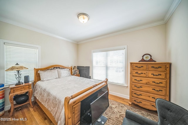 6428 Salem Ridge Dr, Grifton, NC 28530 - bedroom featuring light wood finished floors, ornamental molding, and baseboards