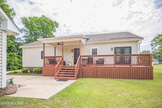 6428 Salem Ridge Dr, Grifton, NC 28530 - back of property featuring a lawn, a ceiling fan, a patio, and roof with shingles