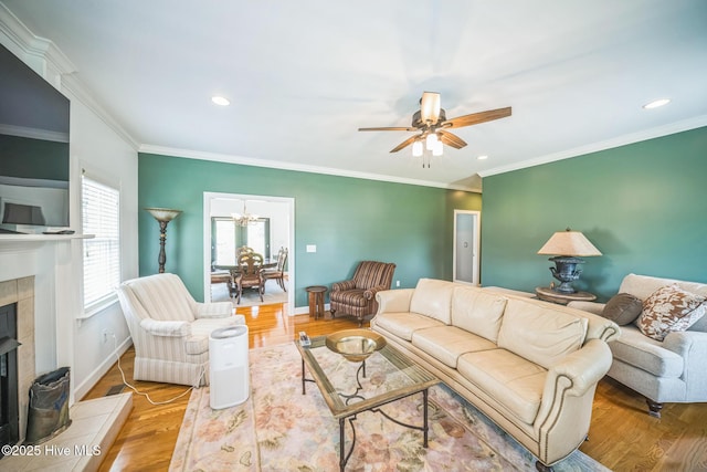 6428 Salem Ridge Dr, Grifton, NC 28530 - living room with a tile fireplace, ceiling fan, wood finished floors, baseboards, and recessed lighting