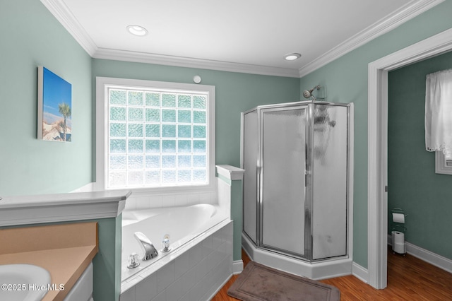 905 Sebring Dr, Winterville, NC 28590 - full bath with a stall shower, a garden tub, ornamental molding, wood finished floors, and baseboards