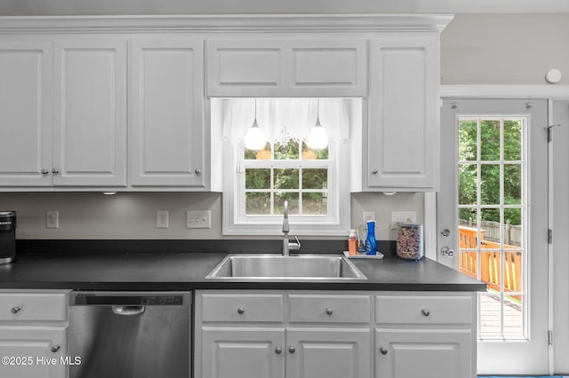905 Sebring Dr, Winterville, NC 28590 - kitchen featuring dishwasher, dark countertops, a sink, and white cabinetry
