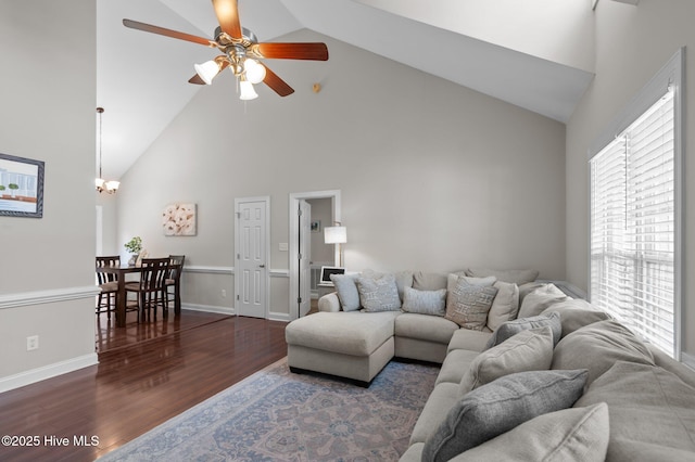905 Sebring Dr, Winterville, NC 28590 - living room featuring high vaulted ceiling, wood finished floors, a ceiling fan, a chandelier, and baseboards
