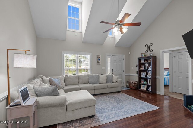 905 Sebring Dr, Winterville, NC 28590 - living area with high vaulted ceiling, ceiling fan, and dark wood-style flooring