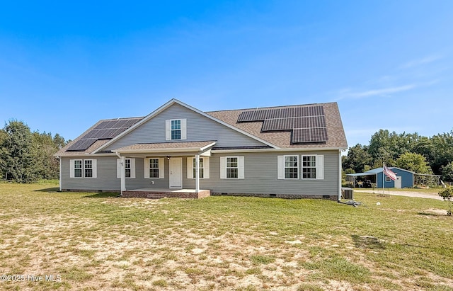 126 Vick Ave, Carthage, NC 28327 - back of house featuring crawl space, roof with shingles, roof mounted solar panels, a porch, and a yard