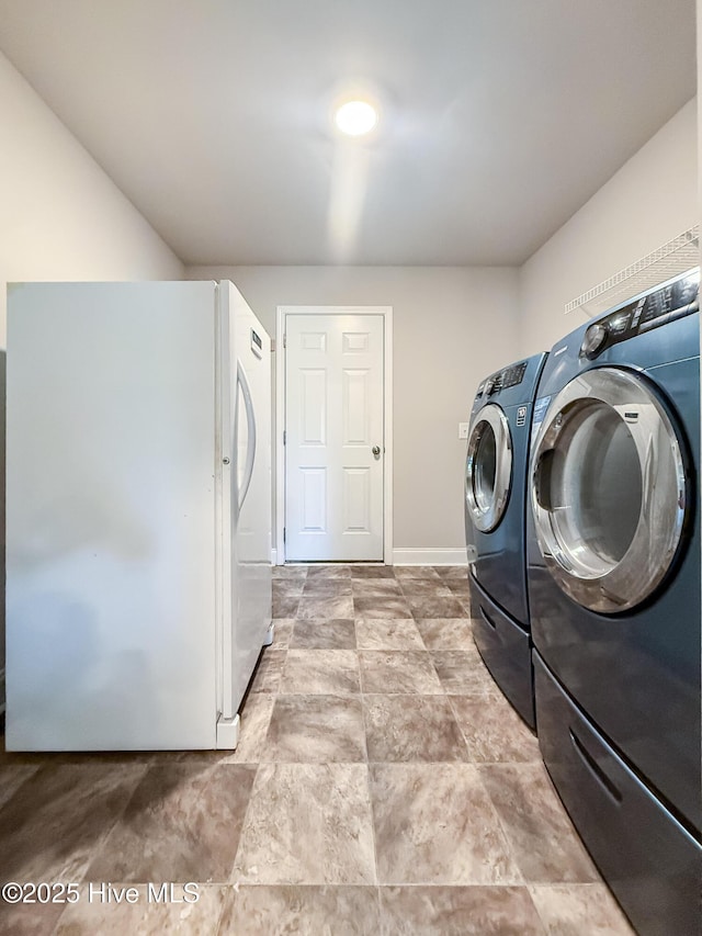 126 Vick Ave, Carthage, NC 28327 - washroom with separate washer and dryer and baseboards