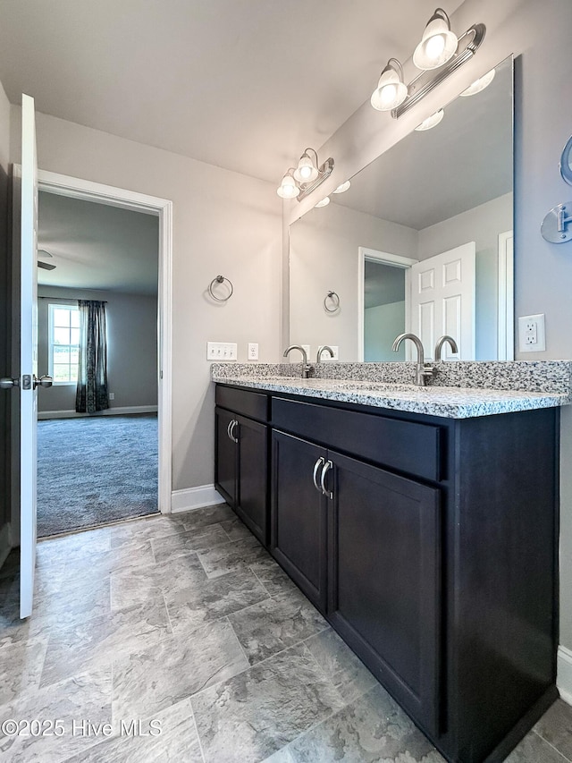 126 Vick Ave, Carthage, NC 28327 - bathroom with double vanity and baseboards