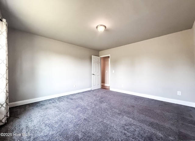126 Vick Ave, Carthage, NC 28327 - empty room featuring baseboards and dark carpet