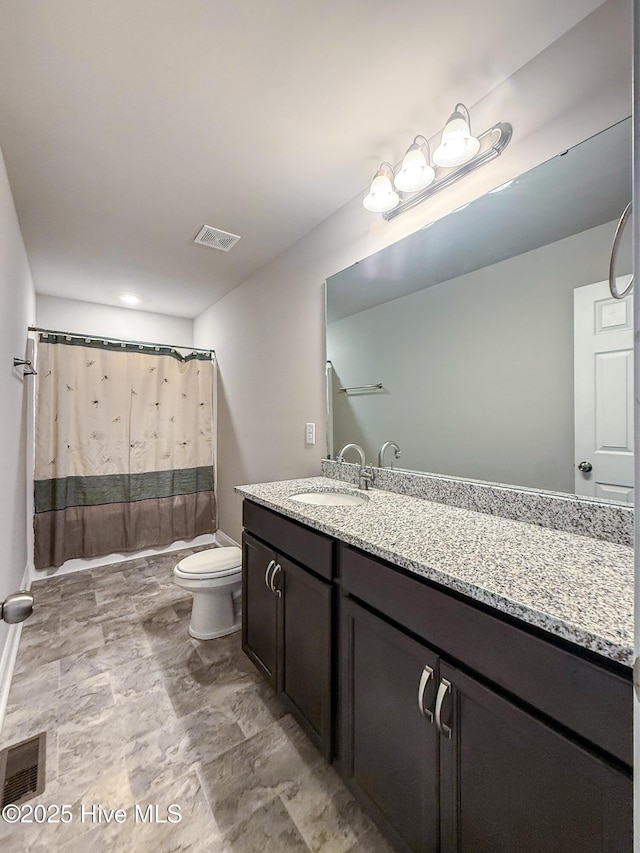 126 Vick Ave, Carthage, NC 28327 - full bath featuring toilet, vanity, a shower with curtain, and baseboards