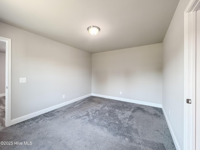 126 Vick Ave, Carthage, NC 28327 - empty room featuring baseboards and dark colored carpet