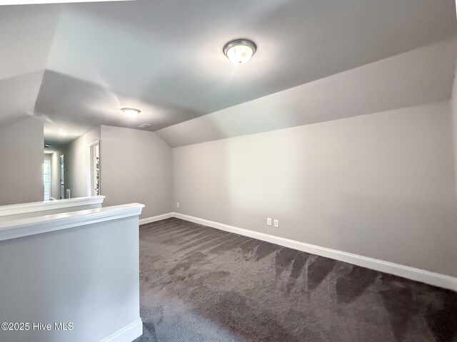 126 Vick Ave, Carthage, NC 28327 - bonus room with dark carpet, baseboards, and lofted ceiling