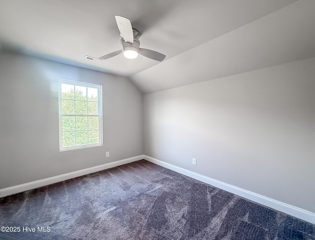 126 Vick Ave, Carthage, NC 28327 - empty room with ceiling fan, dark carpet, baseboards, and lofted ceiling