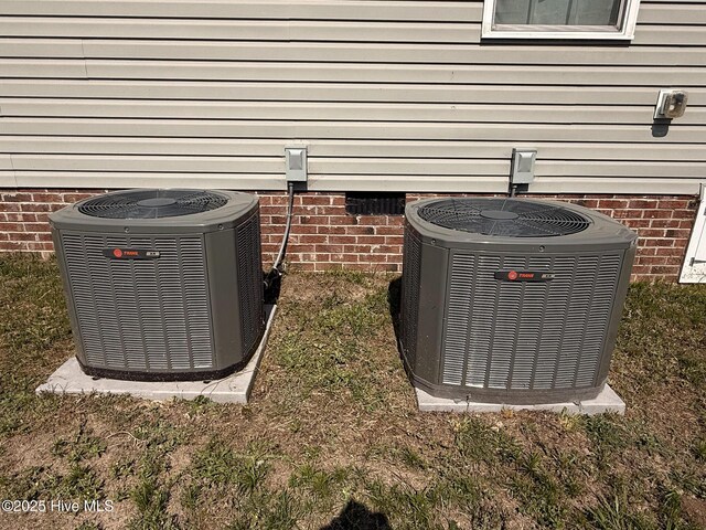126 Vick Ave, Carthage, NC 28327 - exterior view of central AC unit and crawl space