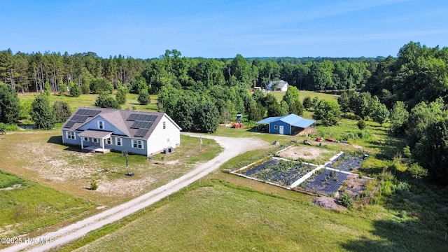 126 Vick Ave, Carthage, NC 28327 - aerial view of property and surrounding area featuring a heavily wooded area