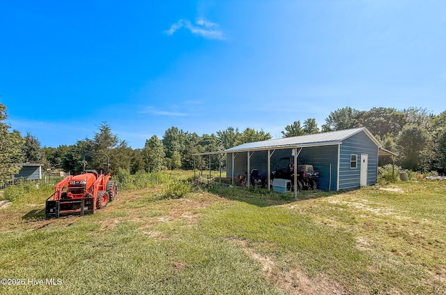 126 Vick Ave, Carthage, NC 28327 - view of green lawn featuring an outbuilding