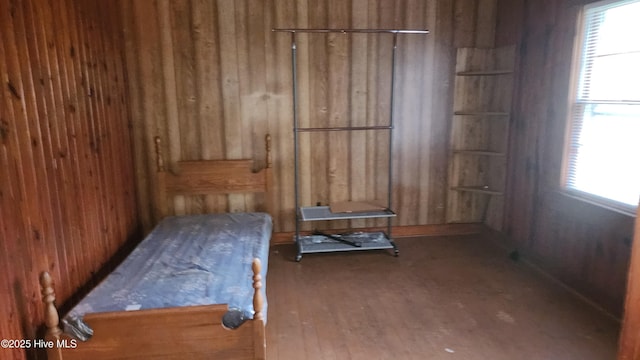 2720 Loop Rd, Loris, SC 29569 - bedroom featuring wood finished floors and wooden walls