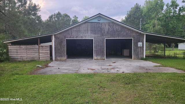 2720 Loop Rd, Loris, SC 29569 - garage featuring a garage and driveway