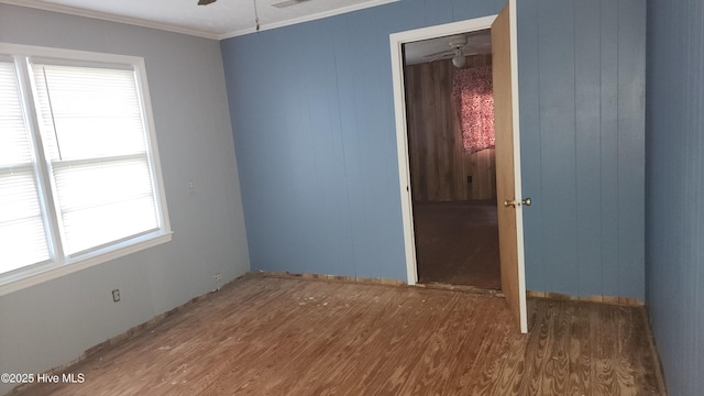 2720 Loop Rd, Loris, SC 29569 - empty room featuring ceiling fan, wood finished floors, and ornamental molding